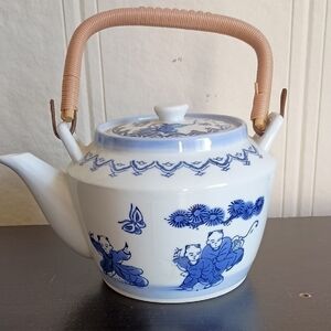 Blue and White Ceramic Teapot with Plastic Handle